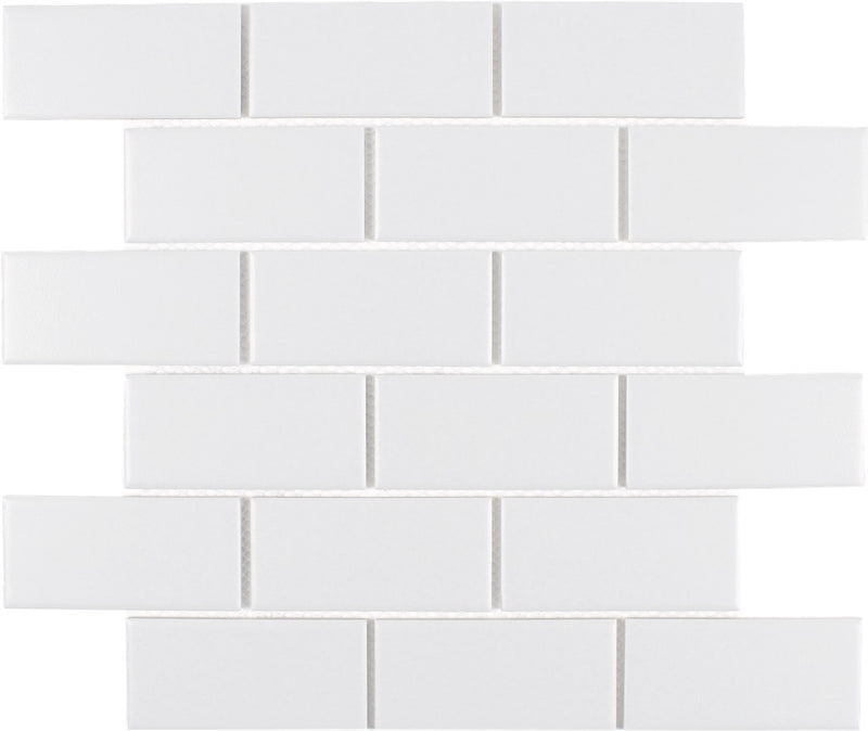 Essentials Porcelain Subway Tile White 2''x4'' in a textured/matte finish for kitchen backs