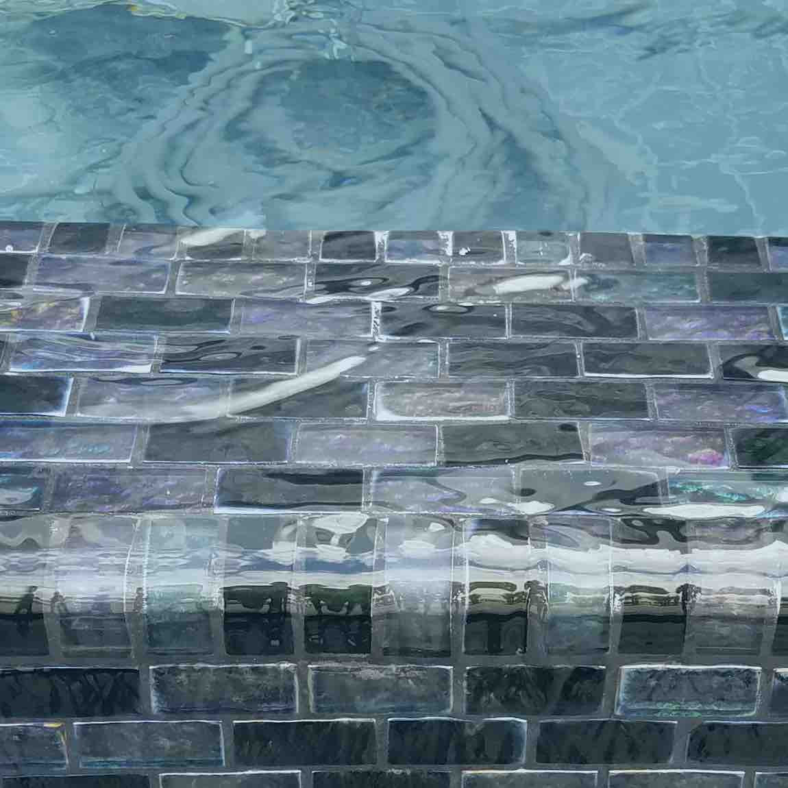 Iridescent Clear Glass Pool Tile Dark Blend 1''x2'' installed underwater