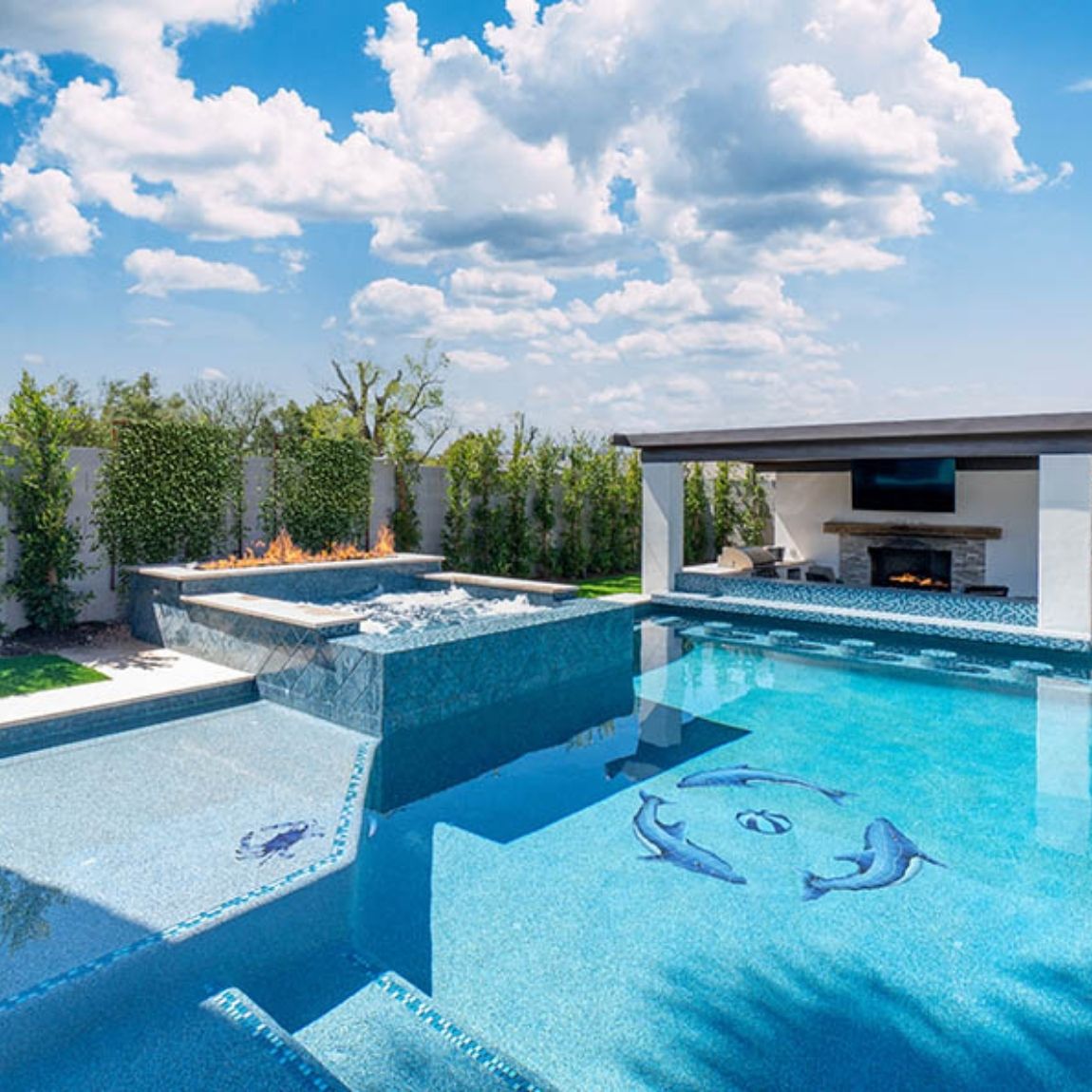 Porcelain Dolphin Group 42x42 Blue Mosaic installed on a swimming pool.