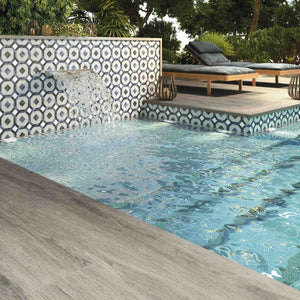Patterned Porcelain Tile Alameda 6x6 featured on a swimming pool waterline and spa