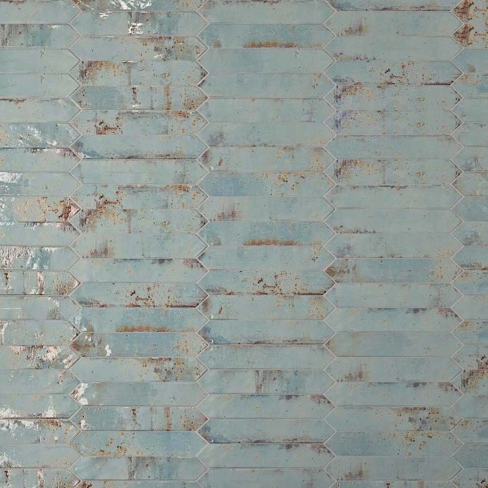 Vintage Distressed Picket Tile Rust 2x10 installed on a wall