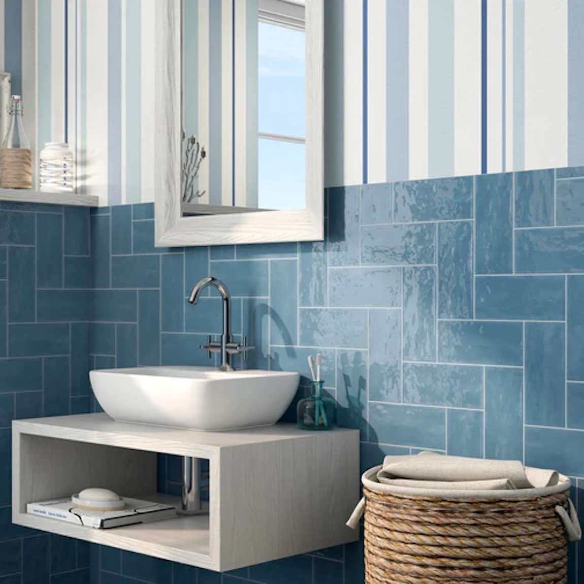 Renaissance Subway Tile Blue 4x10 Ceramic Tile with a lightly uneven surface and glossy finish featured on a bathroom wall