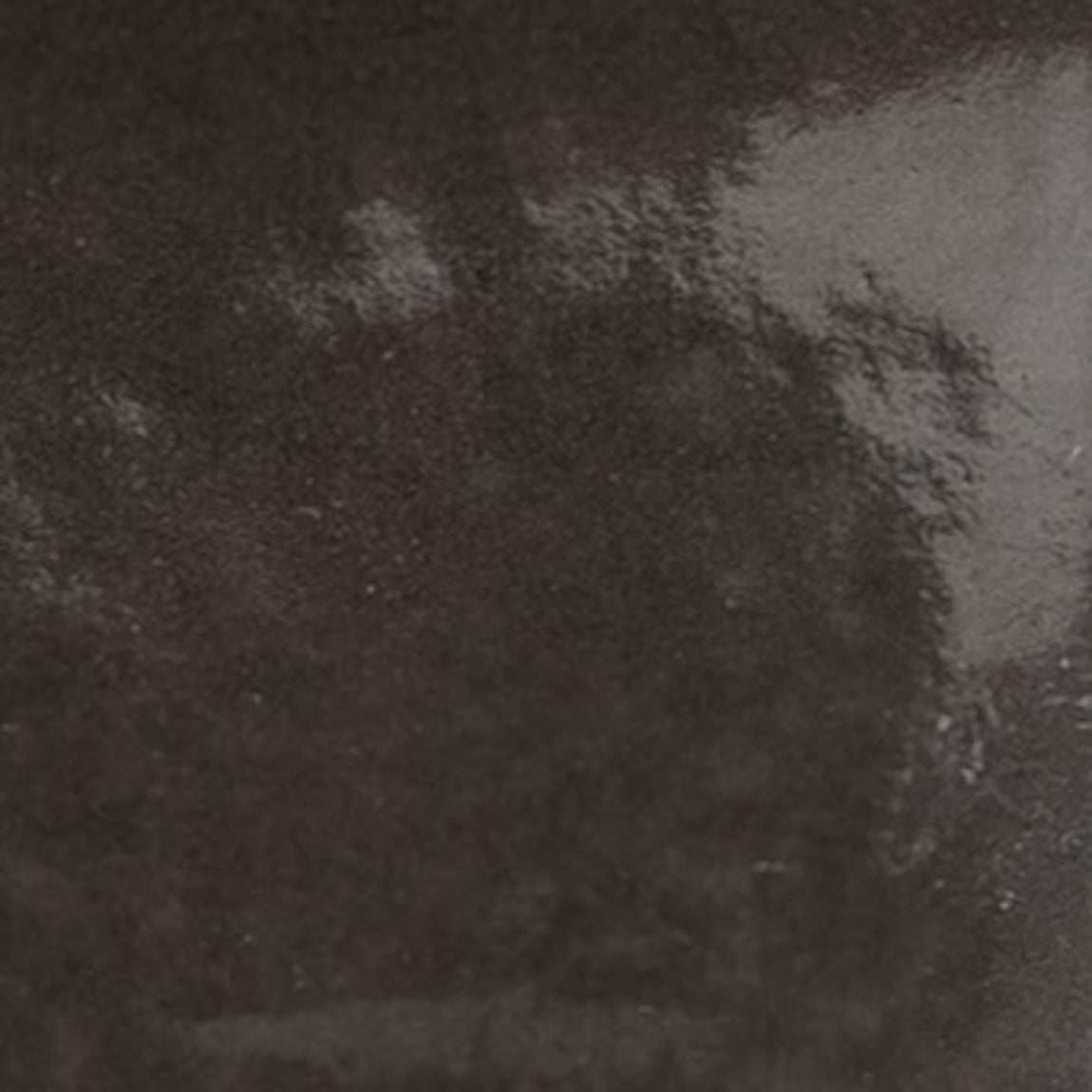 Telouet Porcelain Tile, 1.25" x 1.25", Black Glossy pairs seamlessly with other sizes to create a classic Moroccan-style mosaic pattern for floors and walls