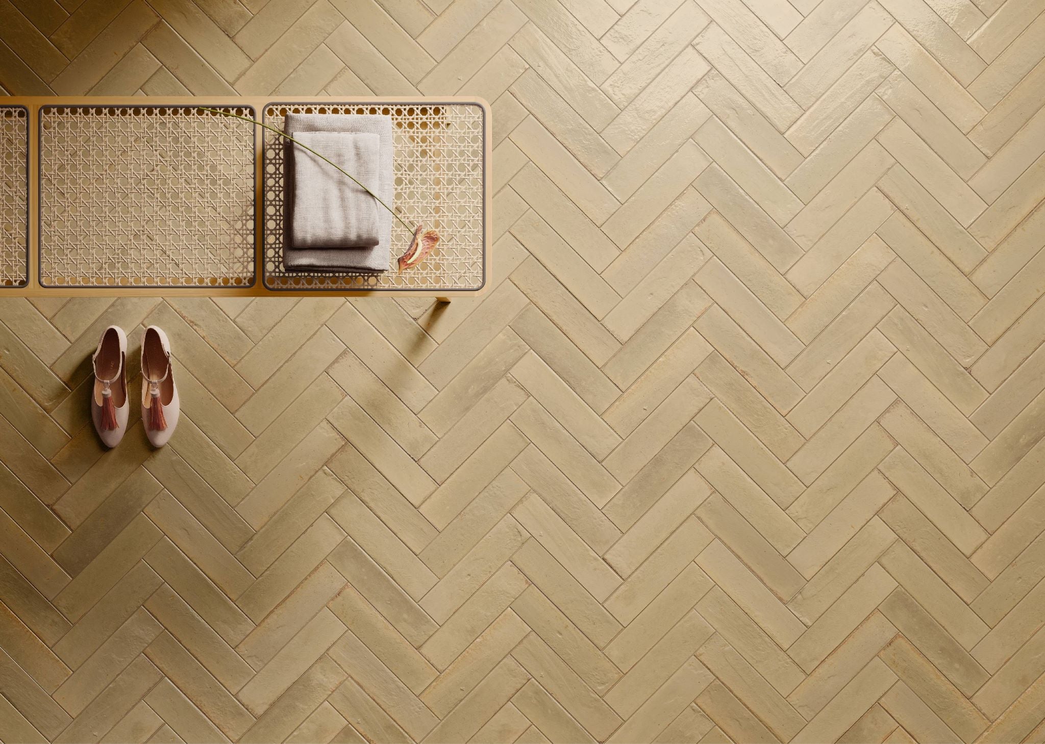 Magnolia distressed beige subway tile 2.5x9.5 installed on a floor, adding a rustic, vintage charm with neutral tones