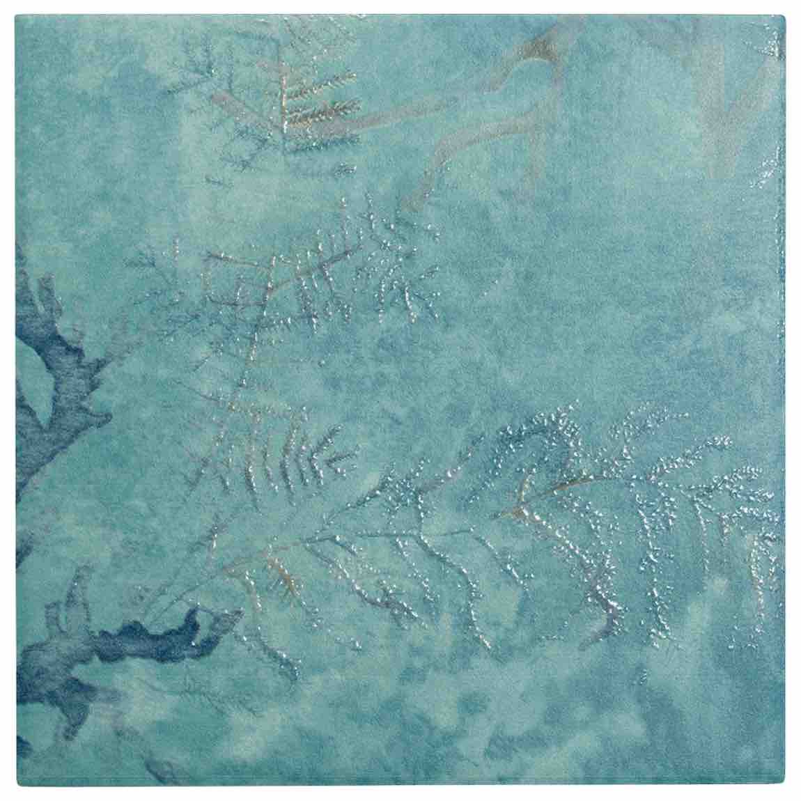 Teal textured surface with abstract patterns