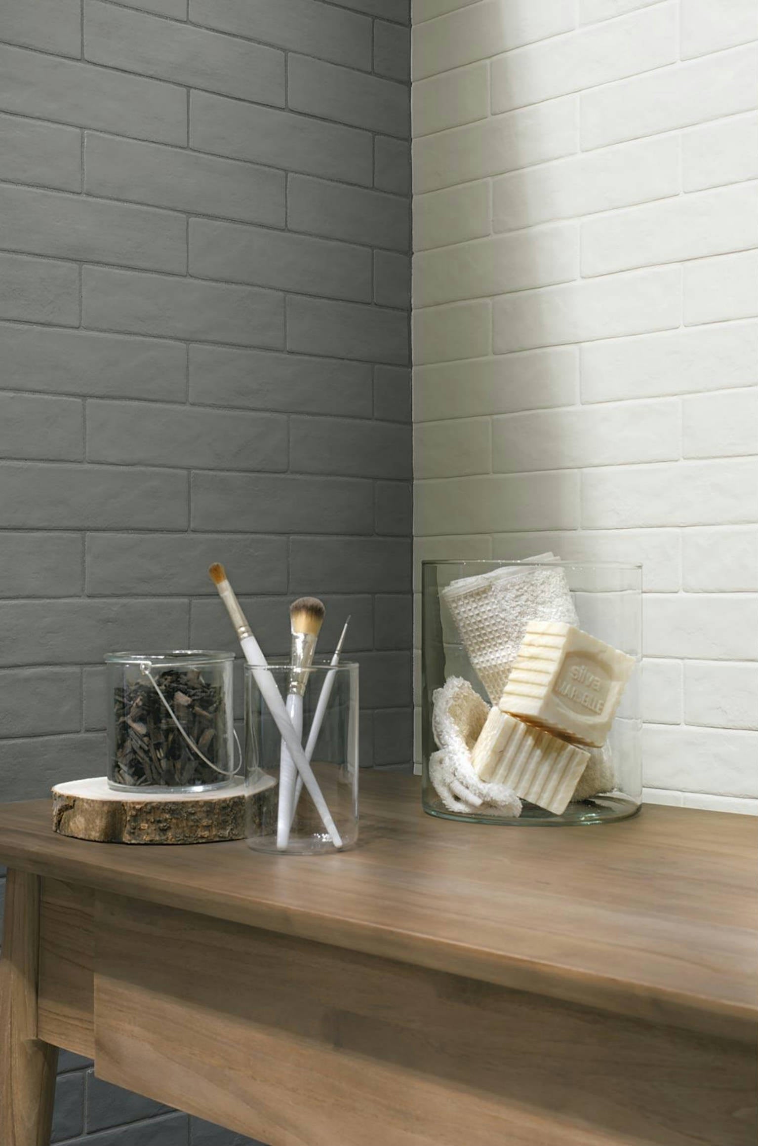 Pure white 3x11 brick-style porcelain tile installed on a wall, offering a clean and minimalist aesthetic
