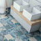 bathroom floor featuring a floral patterned tile blue by Mineral Tiles