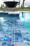pool waterline featuring an iridescent glass mosaic tile by Mineral Tiles