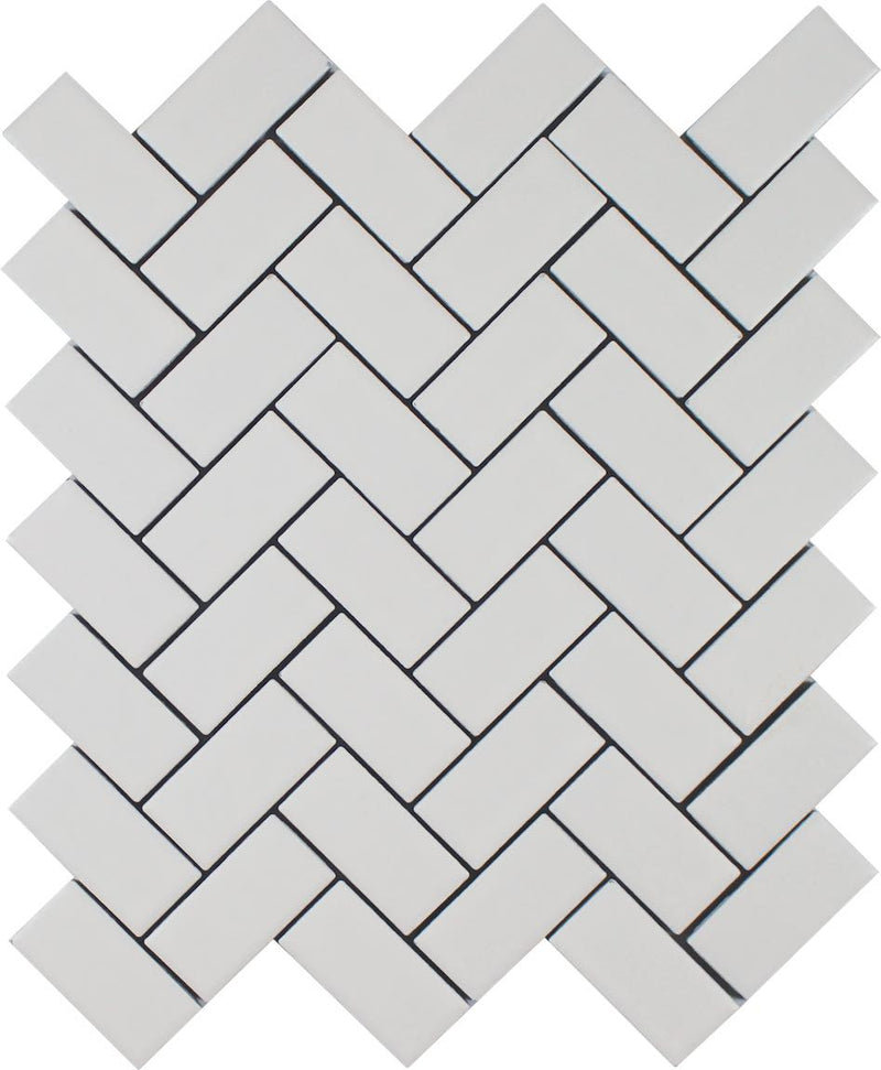 Essentials Herringbone Porcelain Mosaic Tile White in a matte finish for kitchen backsplashes, bathrooms, showers, fireplace, foyers, floors, and accent/featured walls.