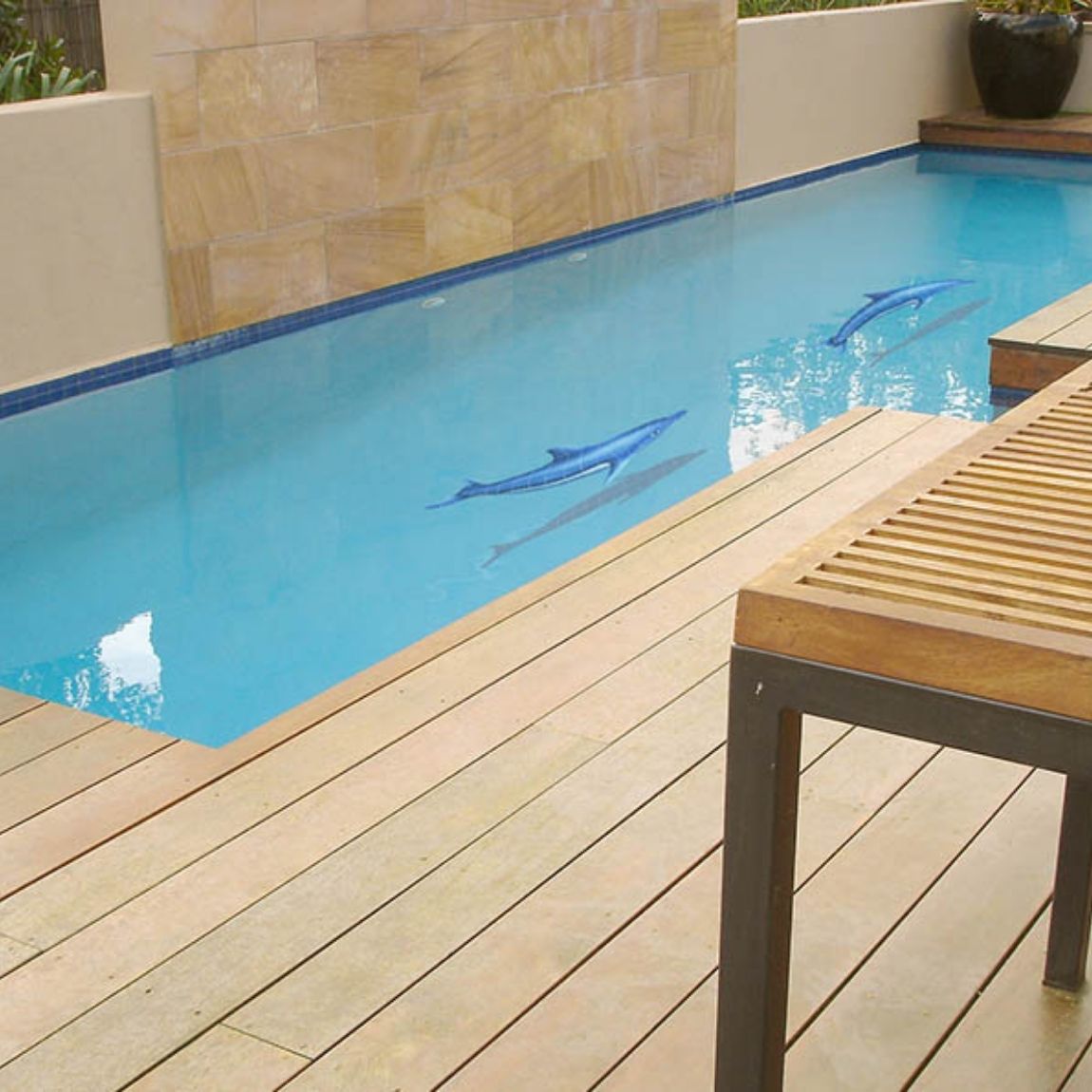 Porcelain Dolphin In The Sun With Shadow Mosaic installed on a swimming pool