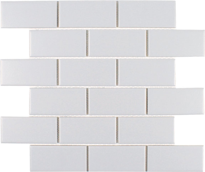 Essentials Porcelain Subway Tile Light Grey 2''x4'' in a textured/matte finish for kitchen backsplashes, bathrooms, showers, fireplace, foyers, floors, and accent/featured walls.