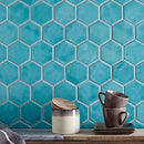 ColorClay Hexagon Tile Aquamarine Glossy 11x13 featured on a accent wall sideboard