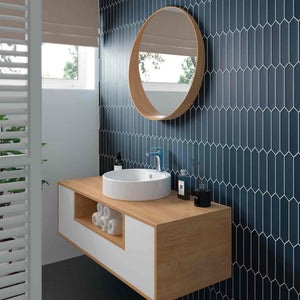 Picket Tile Arrow Navy Matte 2x10 featured on a bright bathroom wall