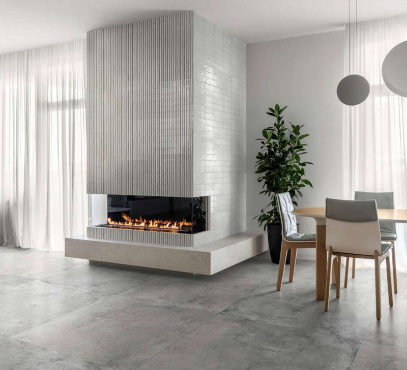 Glacier Italian Porcelain Structure 3D Tile Bianco 3x8 Glossy featured on a contemporary fireplace surround