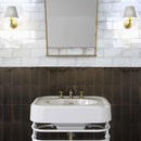 Artigianale Ceramic Tile 4x8 Nero Glossy featured with the Bianco in a bathroom wall