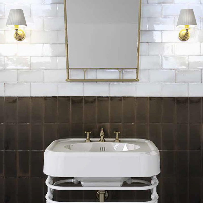 Artigianale Ceramic Tile 4x8 Nero Glossy featured with the Bianco in a bathroom wall