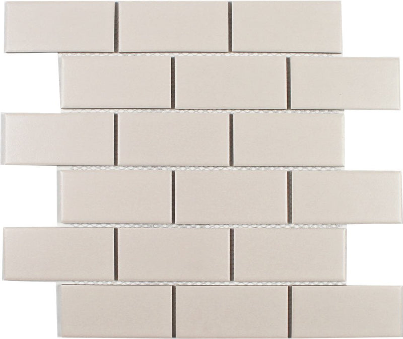 Essentials Porcelain Subway Tile Biscuit 2''x4'' in a textured/matte finish for kitchen backsplashes, bathrooms, showers, fireplace, foyers, floors, and accent/featured walls.