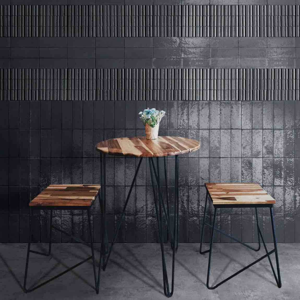 Glacier Italian Porcelain Structure 3D Tile Blu 3x8 Glossy featured on a dinning area accent wall