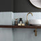 Picket Tile Arrow Blue Matte 2x10 featured on a bathroom backsplash