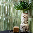 Storie Distressed Tile Jade 3x8 Deco Eye featured on an accent wall