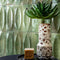 Storie Distressed Tile Jade 3x8 Deco Eye featured on an accent wall
