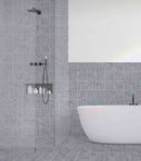 Elegant Grey 6x6 Matte Porcelain Tile featured on a bathroom and shower wall