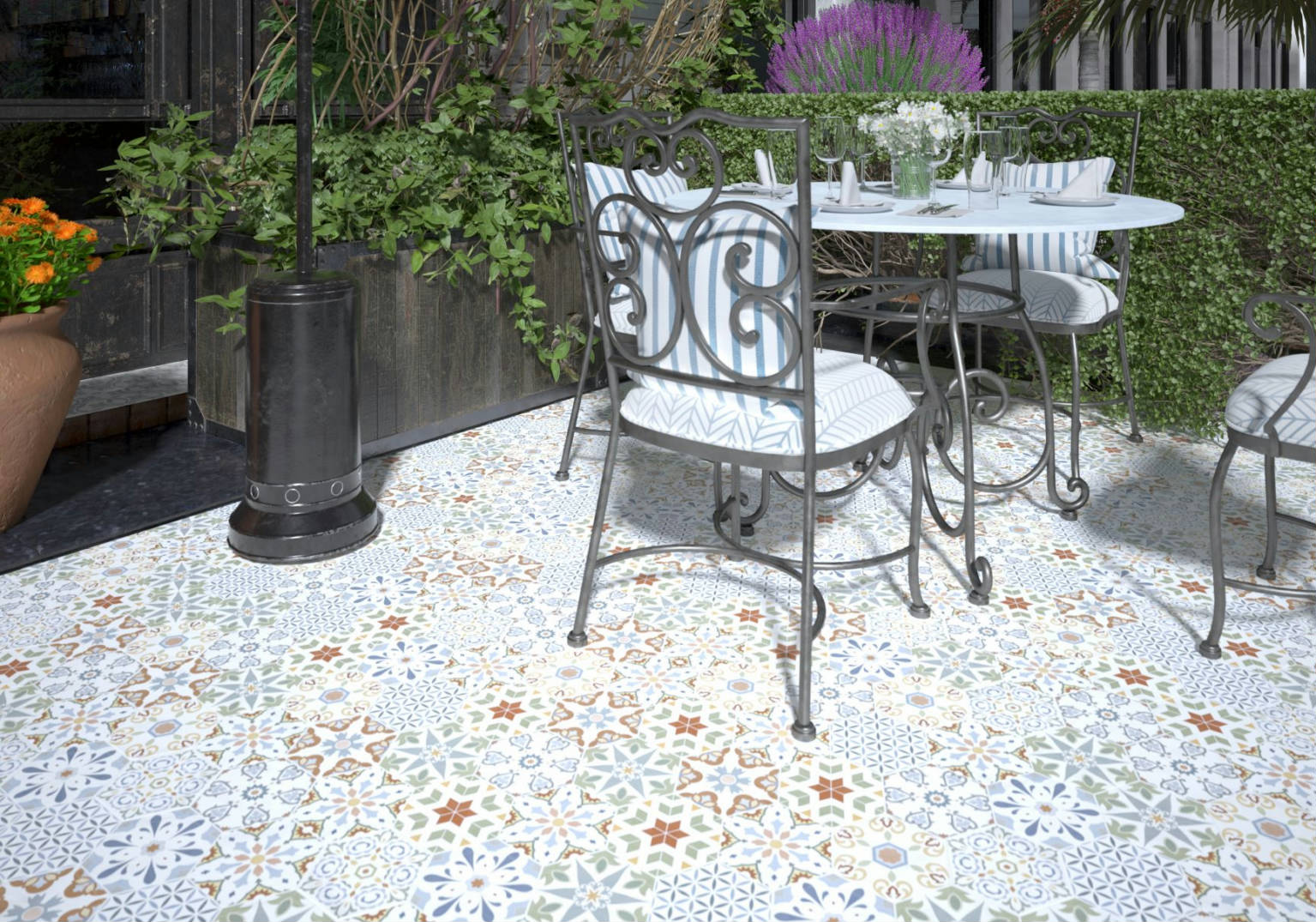 Multicolor patterned porcelain hexagon tile installed on an outdoor dining room floor, offering a bold and lively geometric design that brings energy and color to the space