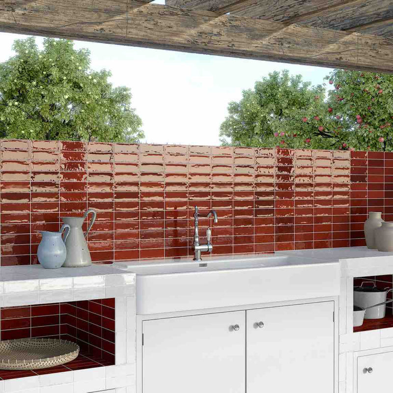 Red outdoor kitchen backsplash featuring thePetite Ville Subway Porcelain Tile Red 2x6 f