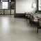 Phoenix Rectified Porcelain Tile 40x40 Smoke Matte featured on a restaurant floor