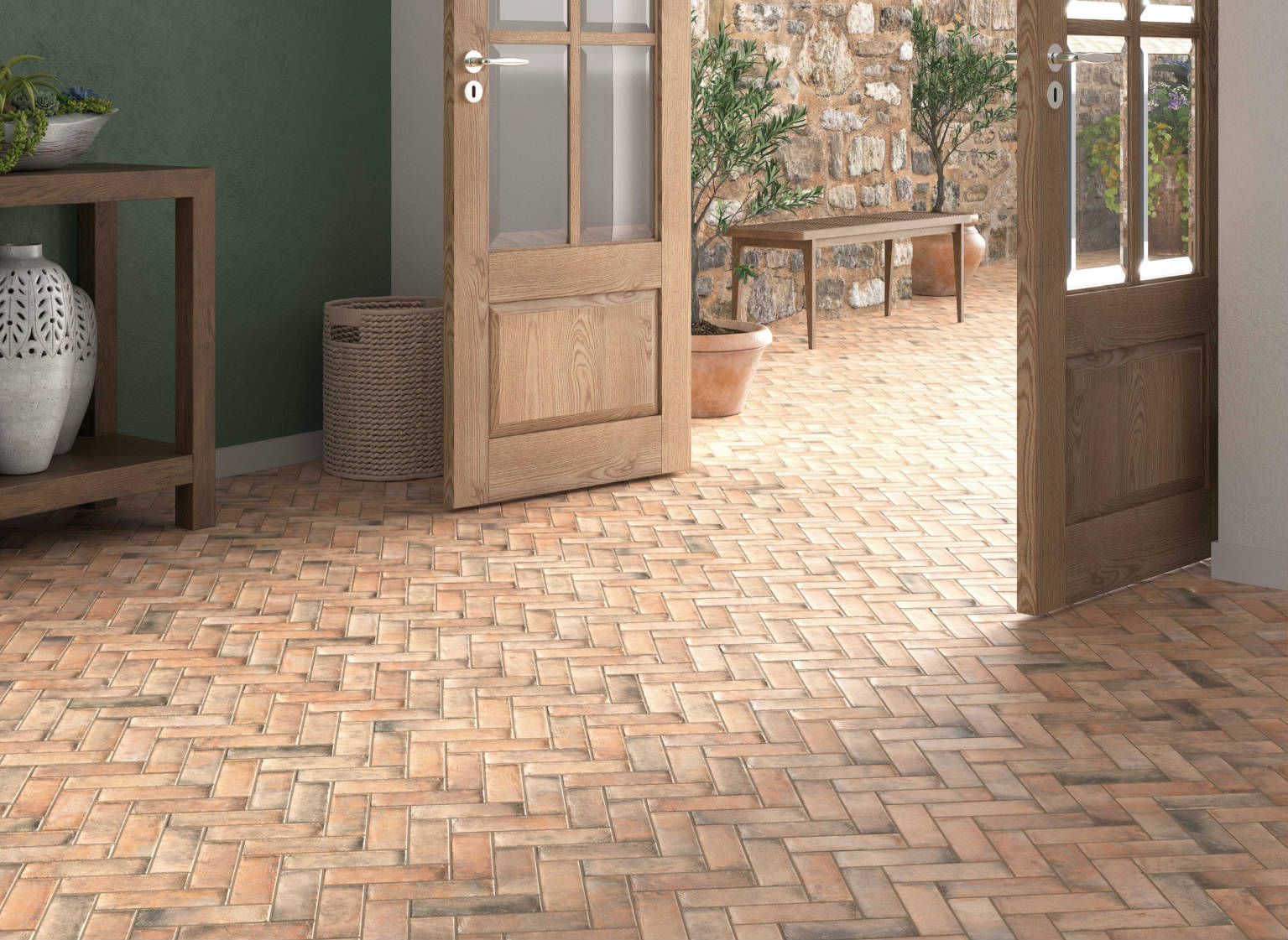 Dark terracotta porcelain tile from the Tavern series, installed on an entrance floor to create a warm, rustic, and inviting first impression