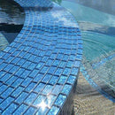 Iridescent Clear Glass Pool Tile Pale Blue 1x2 installed on a pool spa