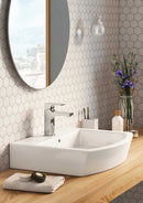 Hexagon Porcelain Mosaic Tile White 2 x 2 Media 2 of 4 on a bathroom vanity