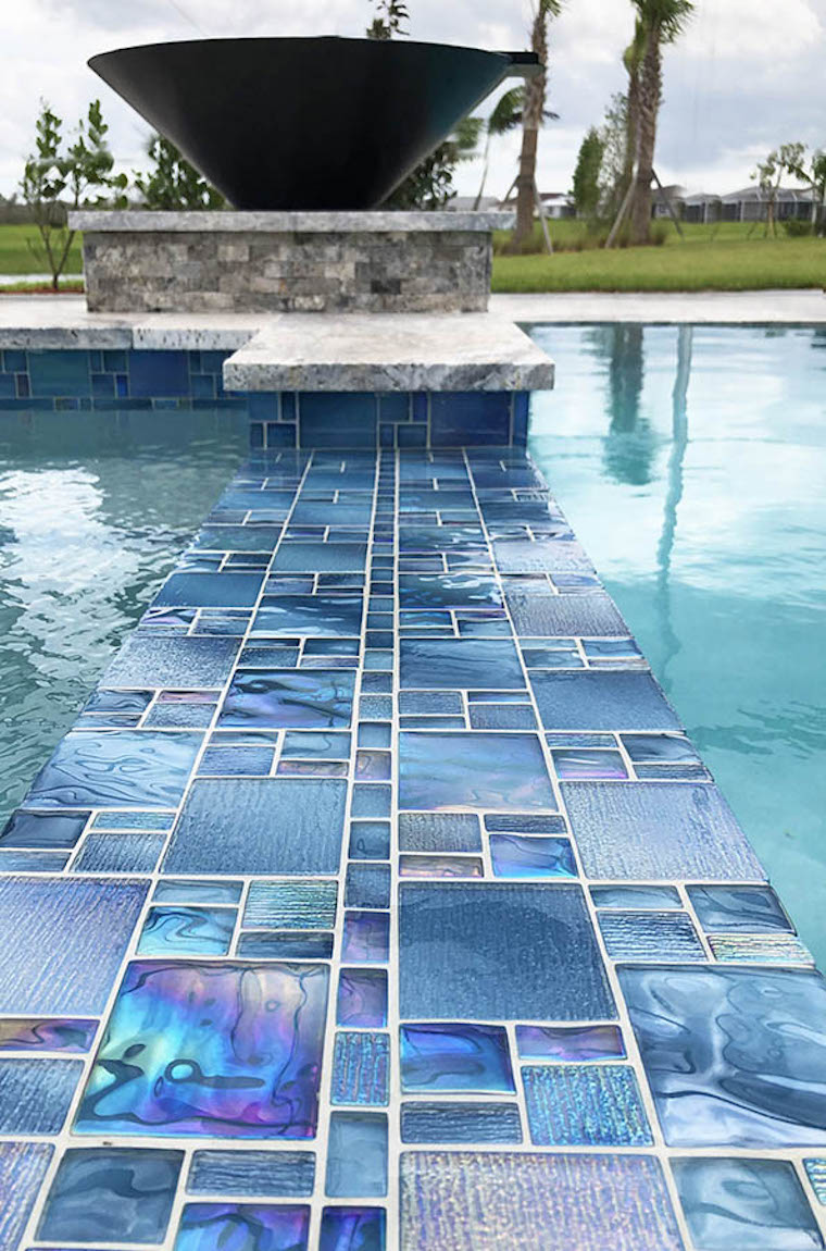 Iridescent Glass Tile French Pattern Space Blue installed on a saltwater spa
