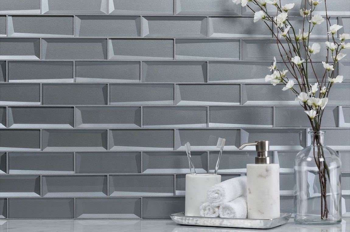 Glass Subway Tile Inverted 3D Metallic 2x6 installed on a modern bathroom vanity backsplash