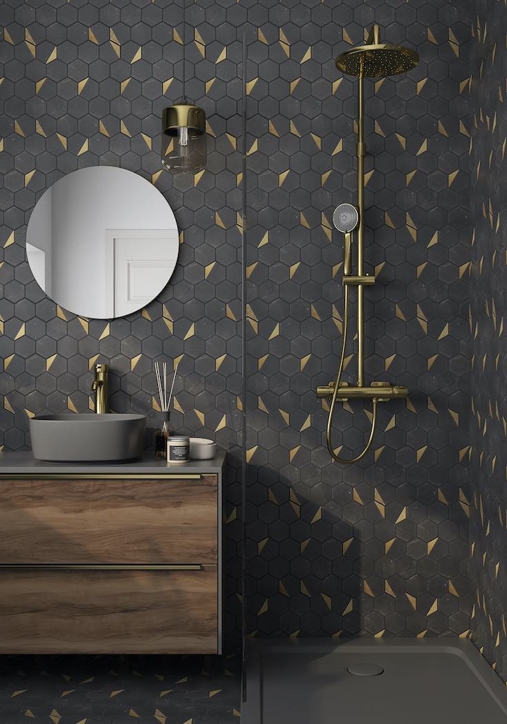 Inlay Brass Gold Nero Hexagon Tile featured on a shower wall