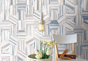 Studio Hexagon Swirl Blue Porcelain Tile 9x10 installed on a featured wall