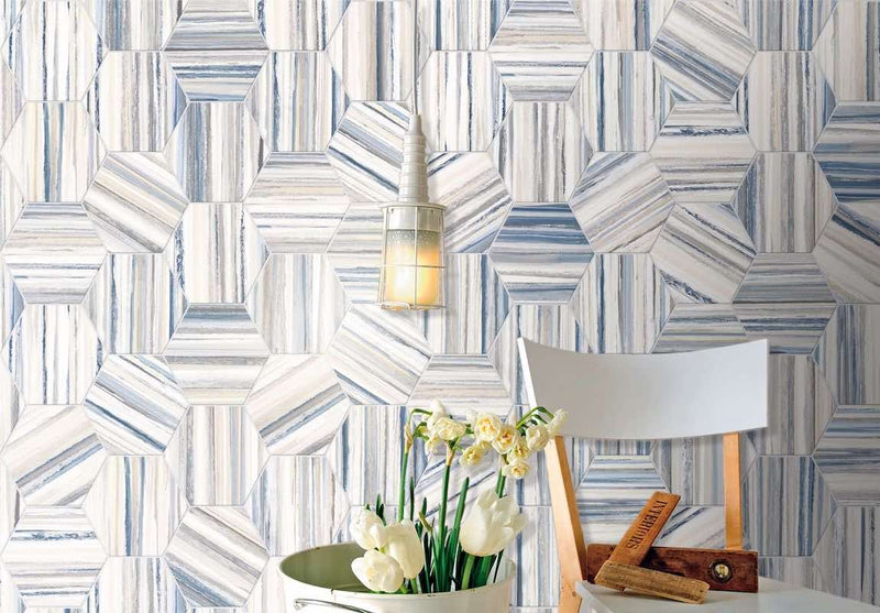 Studio Hexagon Swirl Blue Porcelain Tile 9x10 installed on a featured wall
