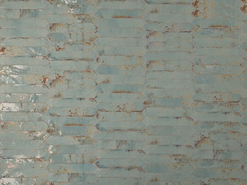Vintage Distressed Picket Tile Rust 2x10 installed on a wall 