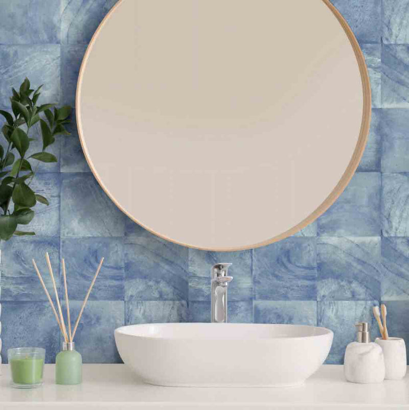 Atol Porcelain Tile Azure 6x6 installed on a bathroom backsplash behind the vanity