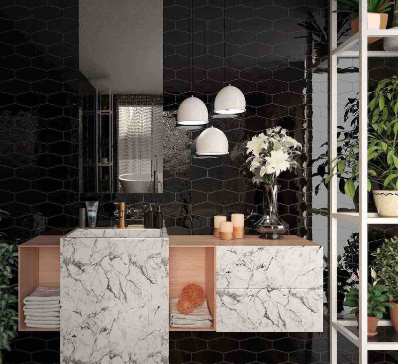 Contemporary bathroom featuring black picket tiles and white marble. 
