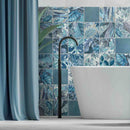 Floral Porcelain Tile Blue Petals 6x6 installed on a bathroom wall