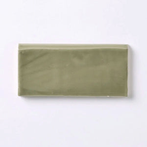 Coastal Green 2.5x5 Bullnose Ceramic Tile to finish the edge of a backsplash and bathroom walls