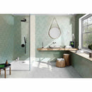 Contemporary bathroom and shower featuring a sea salt green subway tile by Mineral Tiles and wood accents