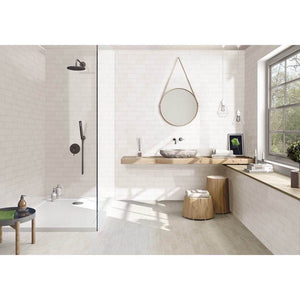 contemporary white bathroom with wood accents and subway tile