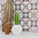 Vintage Patterned Distressed Porcelain Tile Monarch Red 9x9 featured on a kitchen backsplash 