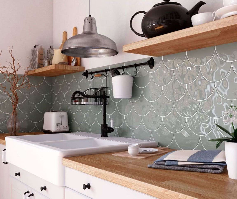 Fish Scale Wall Tile Glossy Grey 6x7 featured on a farmhouse kitchen backsplash with floating shelves