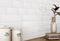 Handcrafted White 3x12 Ceramic Wall Tile featured on a backsplash