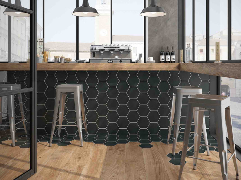 Minimalistic Hexagon Porcelain Tile Black 8x9 installed on a coffee bar