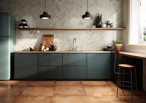 City Subway Tile Ivory Glossy 2x10 installed on a kitchen backsplash with terra cotta floor tiles, wood countertop, and green cabinets