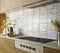 Vintage Distressed Picket Tile Iron 2x10 installed on a contemporary kitchen backsplash